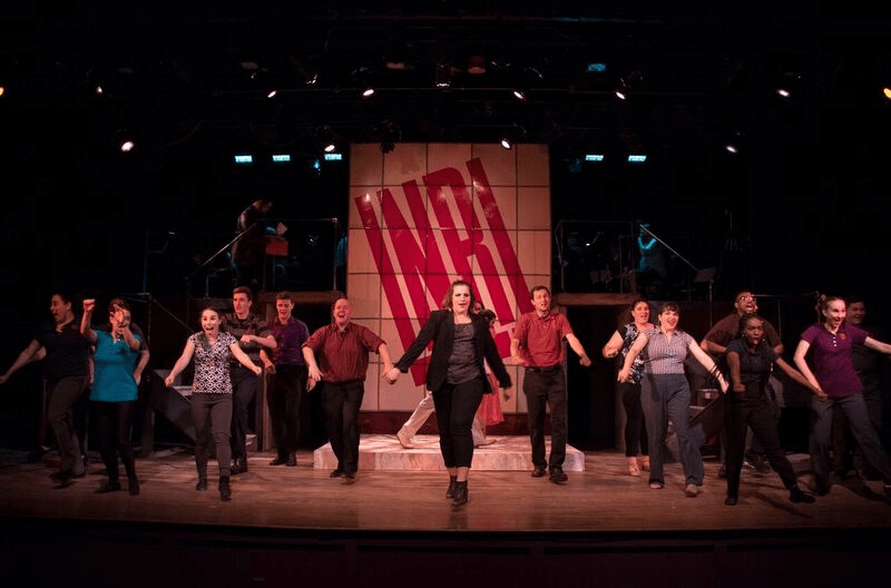 Cody Boehm (Simon Zealotes) in the center with the ensemble in Jesus Christ Superstar, now performing at the Little Theatre of Alexandria. Photo by Matt Liptak.